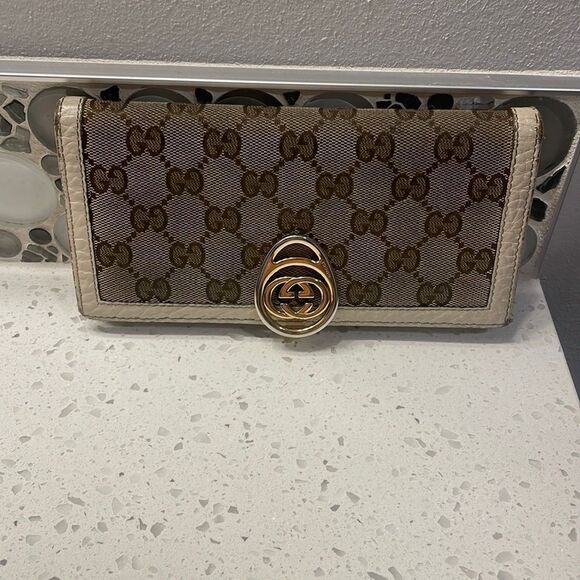 Gucci woman’s canvas and cream leather wallet - Picture 1 of 16